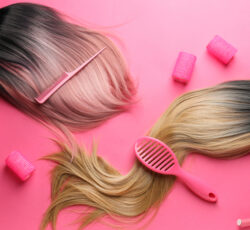 Female,wigs,,brush,,comb,and,curlers,on,color,background